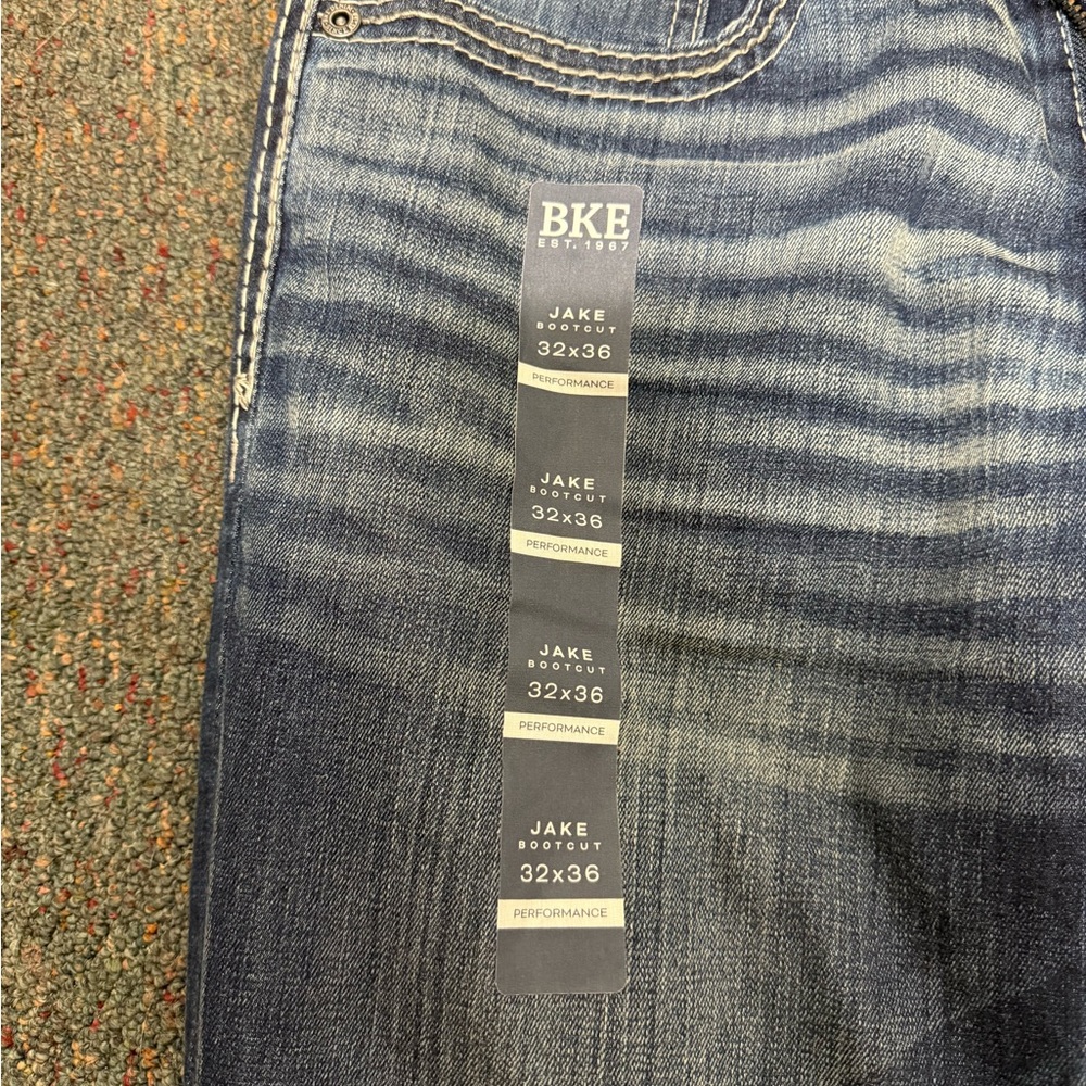 Buckle Blue Bootcut Jeans with Stylish Fading